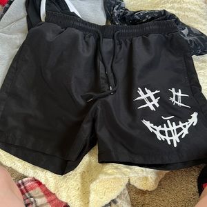 Black shorts with face on it